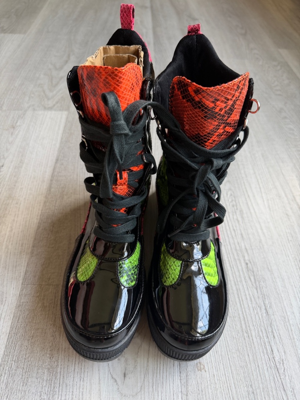 Cape Robbin Black Patent Combat Boots with Neon Green & Orange Snake Print